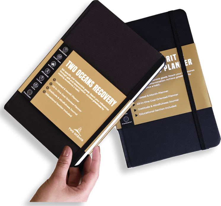 Branded alumni planner held in a hand