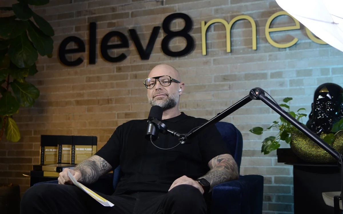 Gary Garth at the mic in the elev8media studio